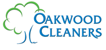 A logo for oakwood cleaners with a tree on it