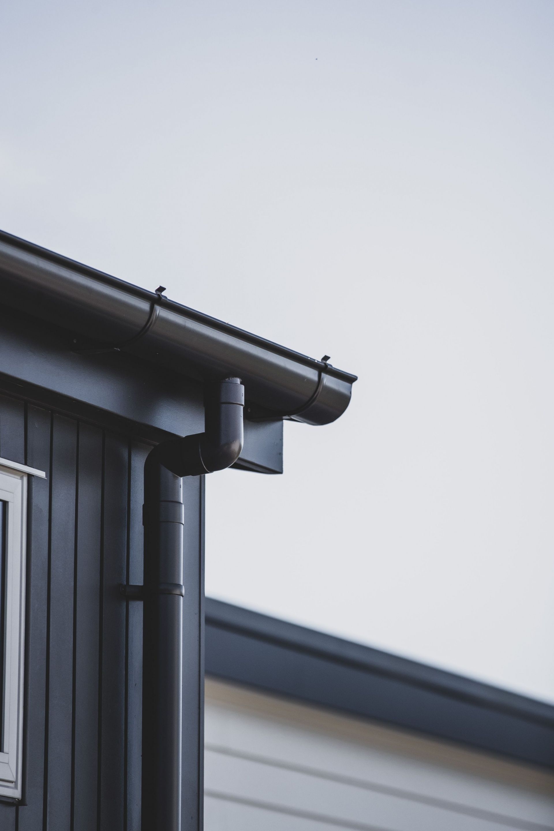 Roof Gutter With Black Pipe — Onehunga, Auckland — Ace Spouting & Fascia