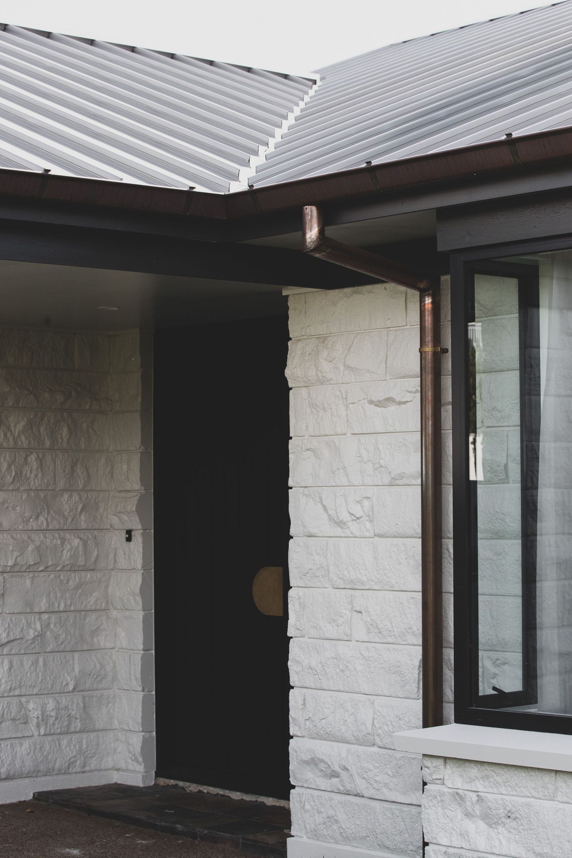 White Paint Wall — Onehunga, Auckland — Ace Spouting & Fascia