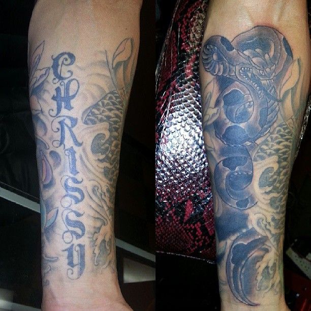 A man has a tattoo of the name chrissy on his forearm