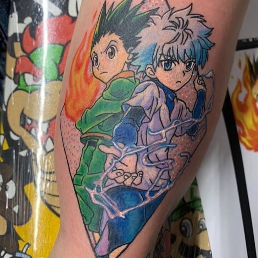 A tattoo of gon and killua from hunter x hunter