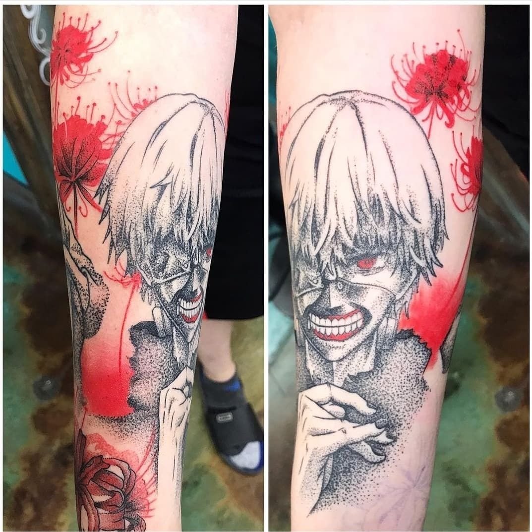 A person has a tattoo of a man with red eyes on their arm.