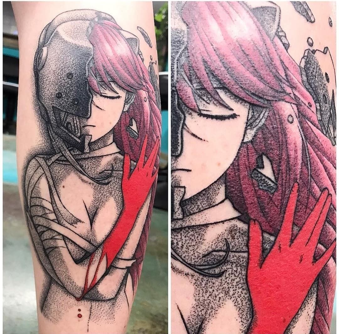 A tattoo of a woman with a red hand on her arm