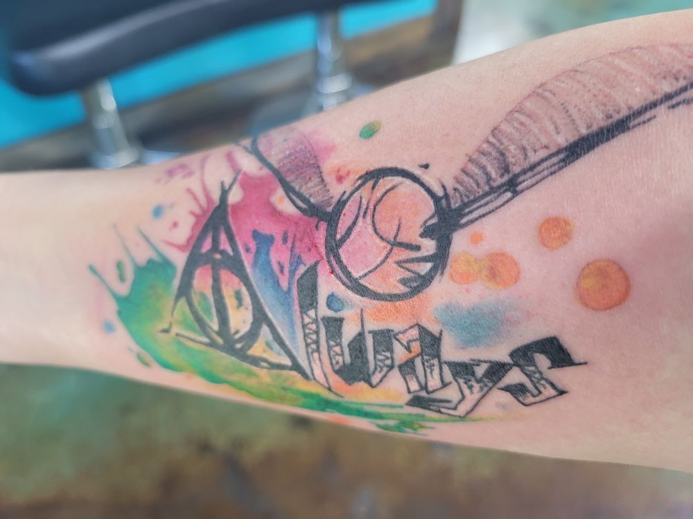 A close up of a tattoo on a person 's arm