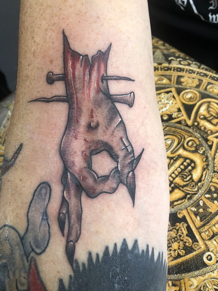 A close up of a tattoo on a person 's arm