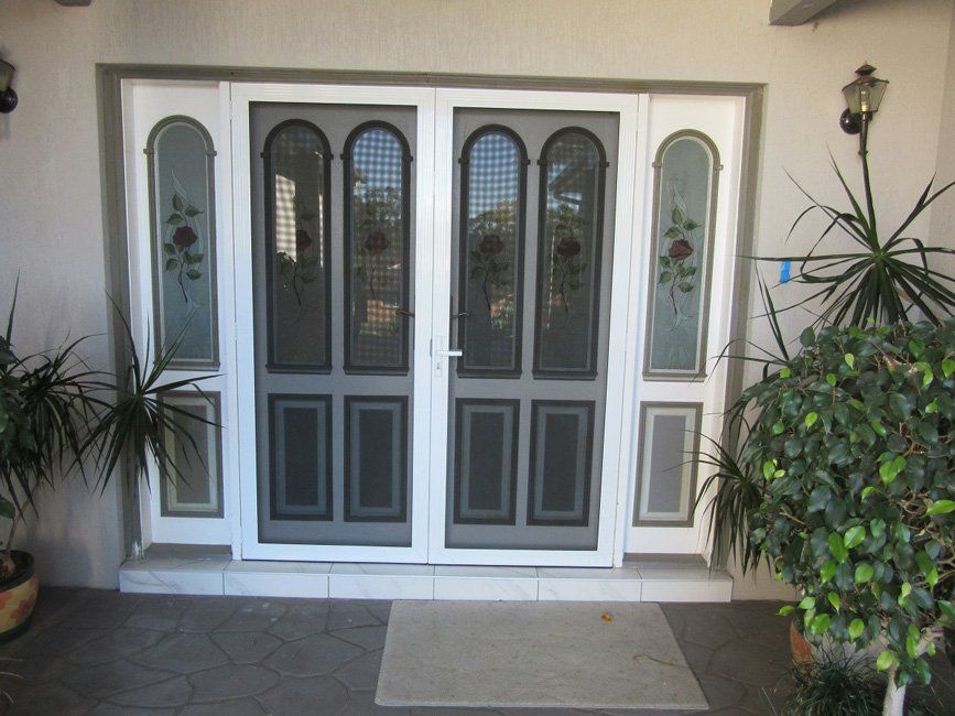 Front Door With Flyscreen — Smith Aluminium In Maitland, NSW