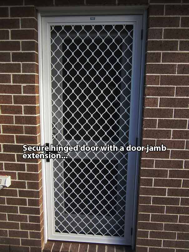 A Secure Hinged Door With A Door Jamb Extension — Smith Aluminium In Cameron Park, NSW