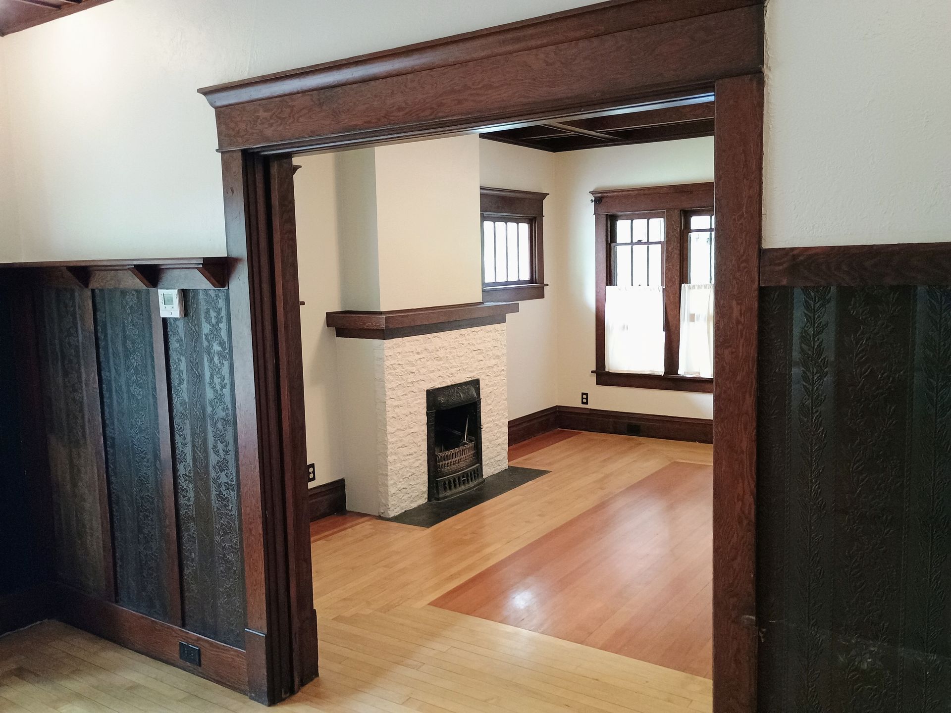 Interior Paint work in home with brick fireplace.