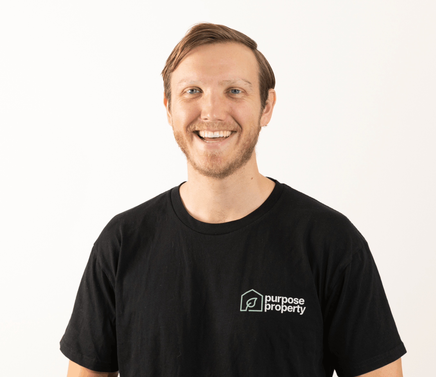 Smiling man in black t-shirt with 