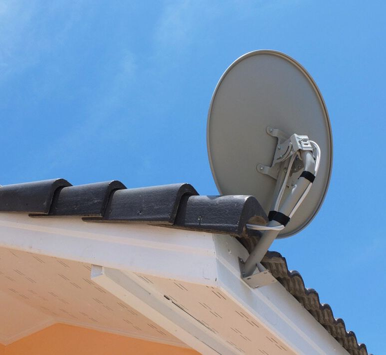 A Satellite Dish On The Roof Of A Building — Outback Internet & Comms In Ciccone, NT