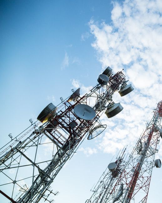 A Bunch Of Antennas Against A Blue Sky With Clouds — Outback Internet & Comms In Ciccone, NT
