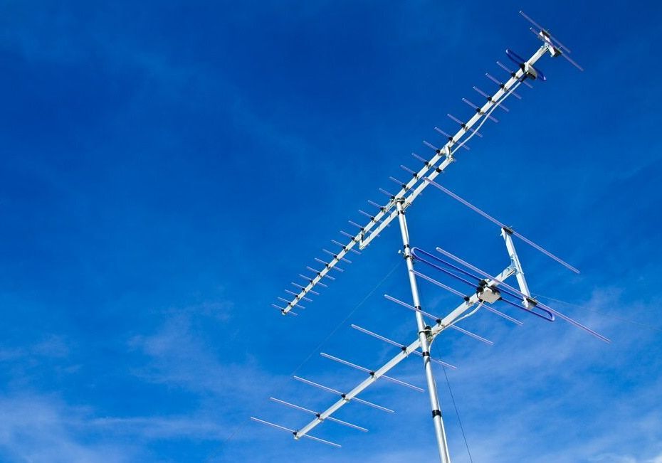 A Large Antenna Is Against A Blue Sky — Outback Internet & Comms In Ciccone, NT