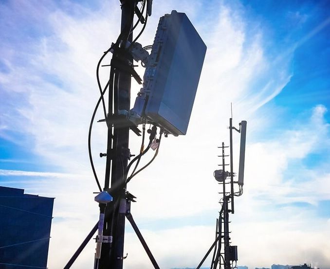 Two Antennas On A Pole With A Blue Sky In The Background — Outback Internet & Comms In Ciccone, NT
