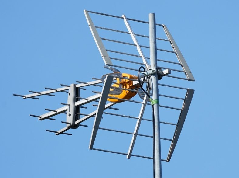 A Large Antenna Is Against A Blue Sky — Outback Internet & Comms In Ciccone, NT