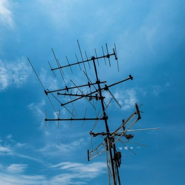 A Large Antenna Against A Blue Sky With Clouds — Outback Internet & Comms In Ciccone, NT
