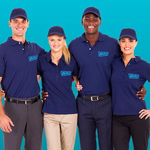 Four people in navy blue uniforms and caps stand together, smiling. Teal background.