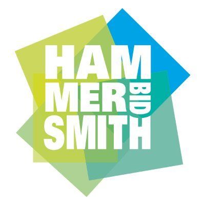 HAMMERSMITH BID logo with white text on overlapping translucent green and blue squares.