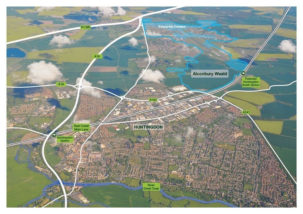 Girl on a swing set at a playground, wearing a blue dress and jean jacket, with other children nearby.