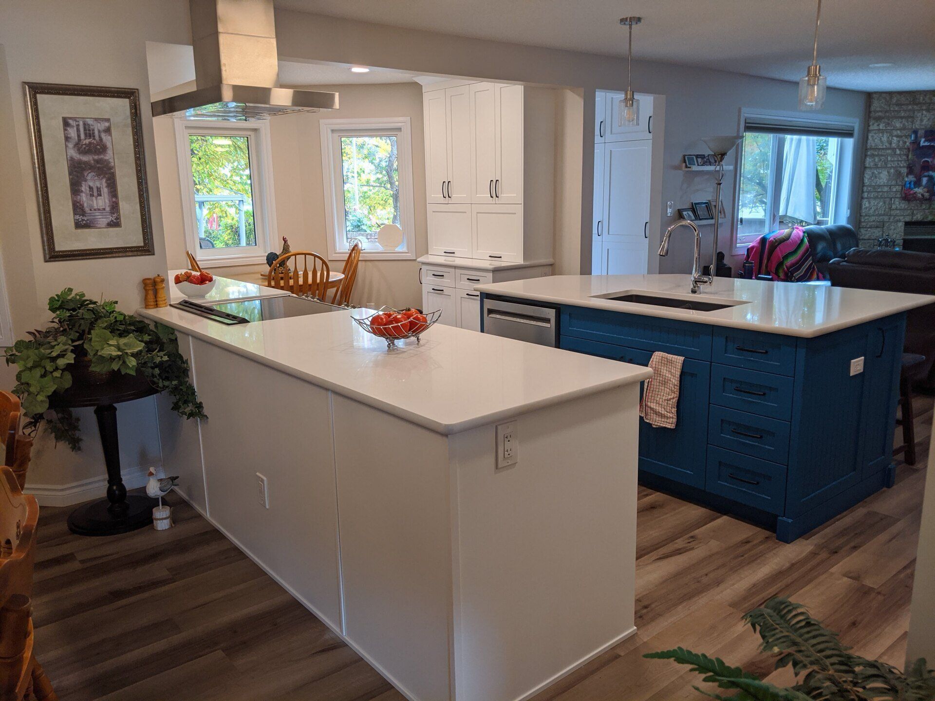 There is a large island in the middle of the kitchen.