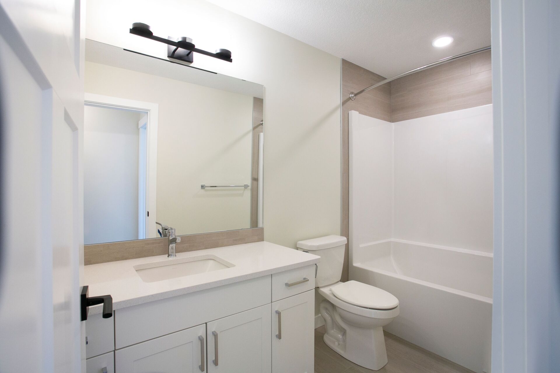 basement bathroom with tub