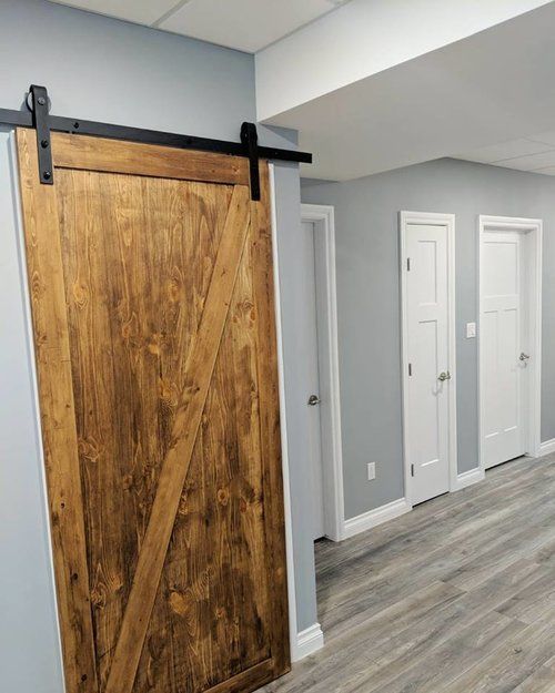 barn style sliding door in basement