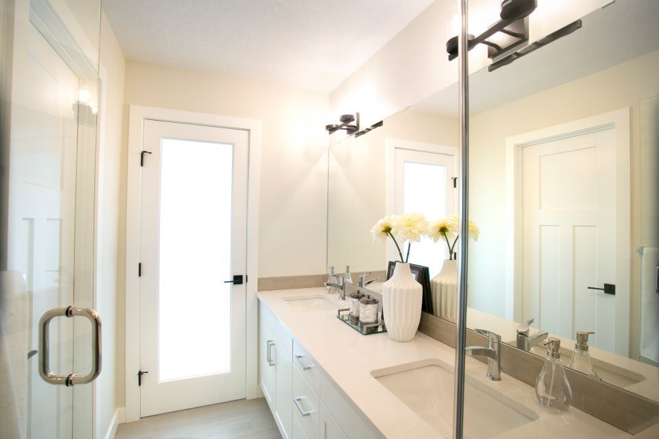 custom bathroom with his and her sinks