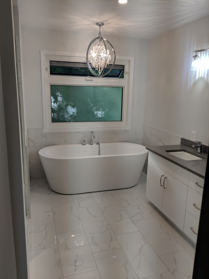 custom bathroom with huge custom tub