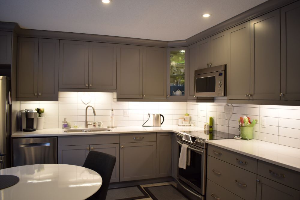 custom kitchen with grey cabinets