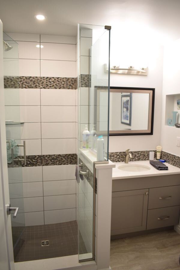 new bathroom with glass doors to shower