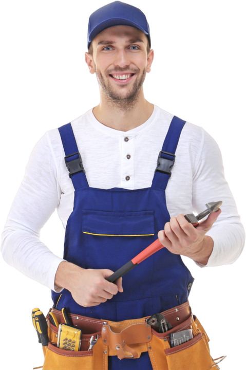 a plumber in overalls is holding a wrench