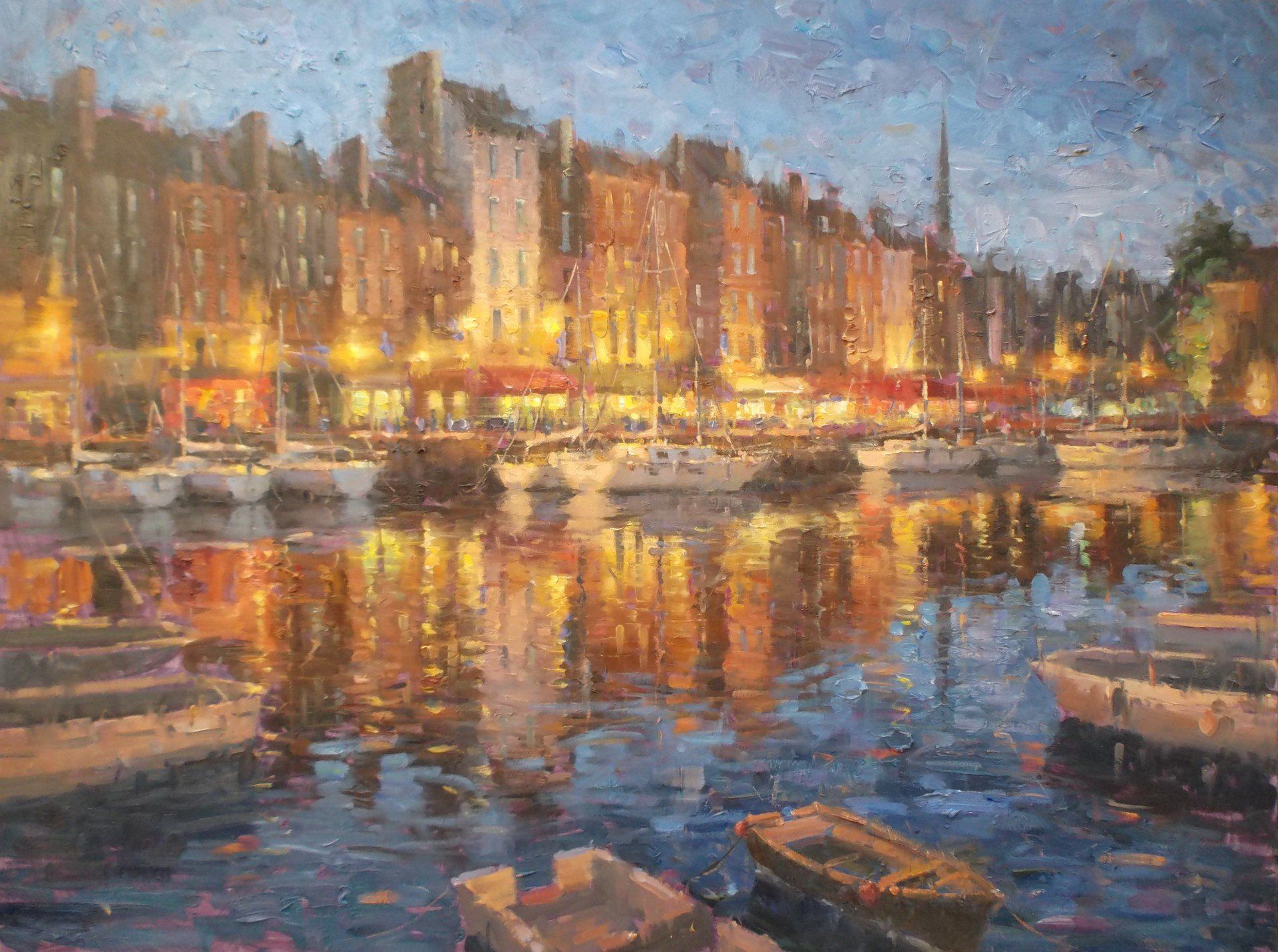 A painting of boats in a harbor at night with buildings in the background.