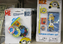 Two packaged toy kits featuring Minion graphics, colorful spinning discs, and a “4 piece study kit” label