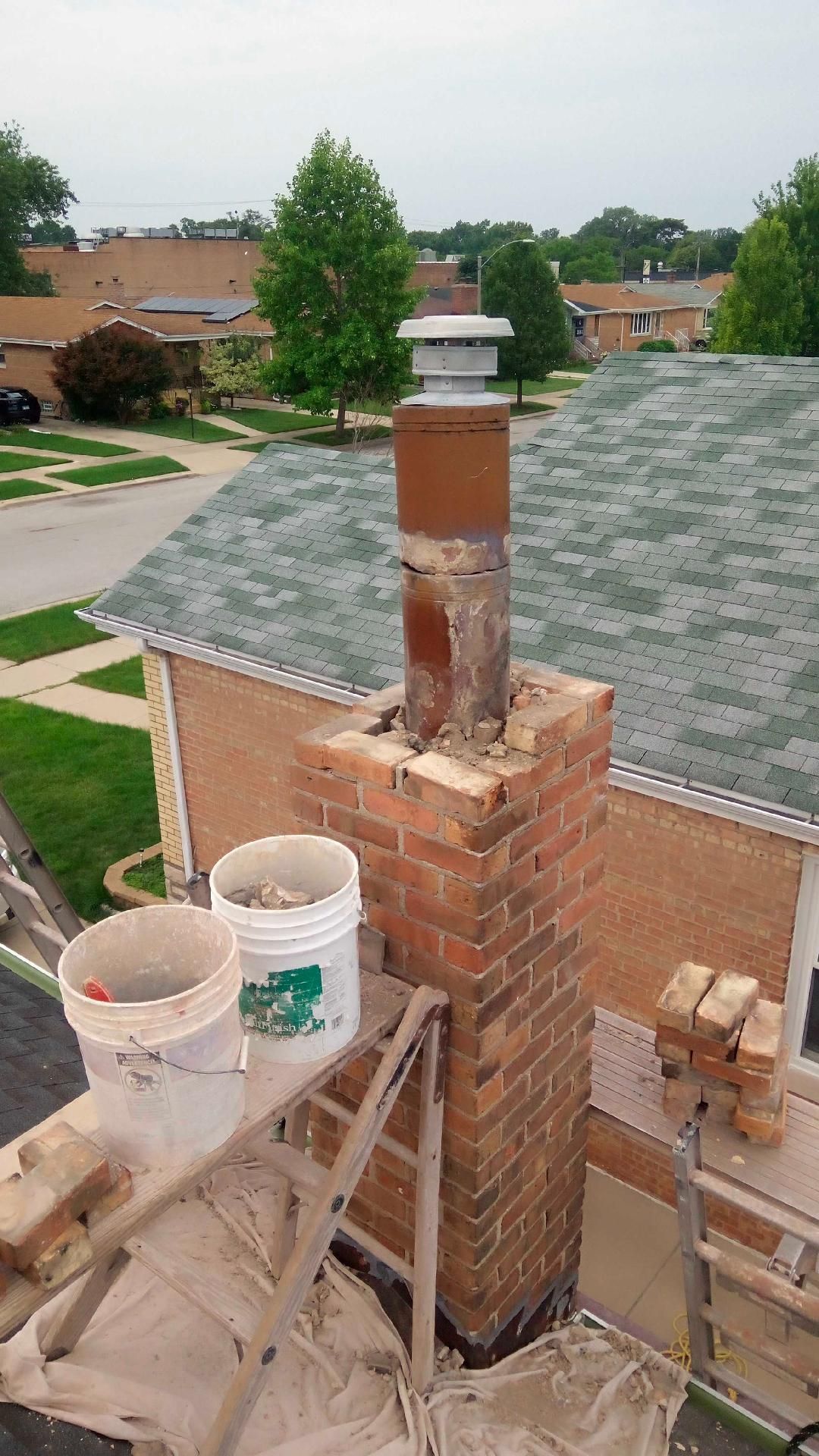 Before chimney tuckpointing repair in Evergreen Park, IL