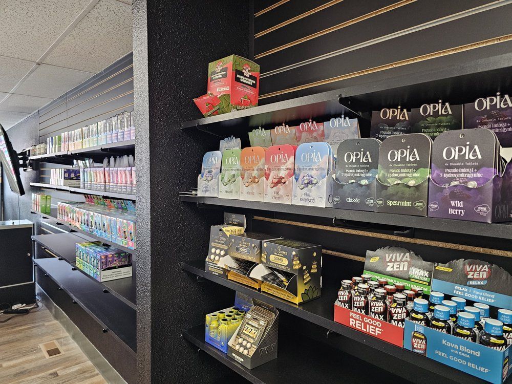 Store shelves displaying various colorful boxes of consumer products, including Opia and Viva Zen brands.