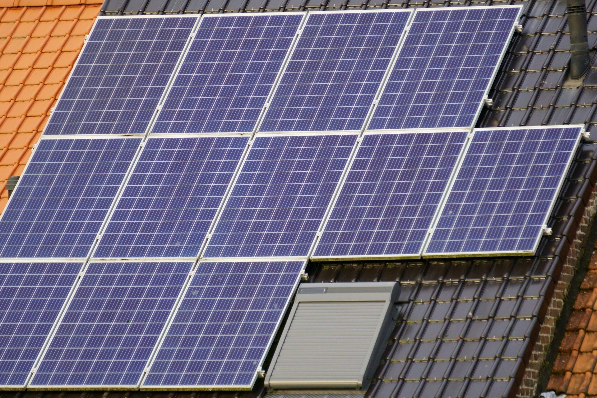 Solar panels on a tiled roof.