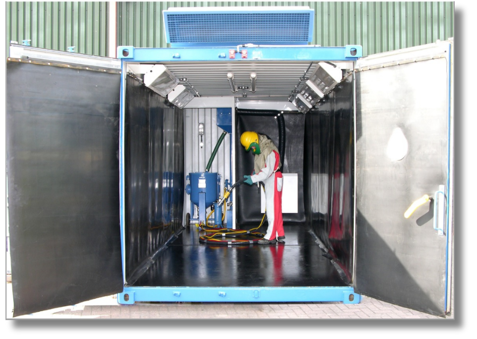 Portable blast booth with operator inside containerized blast system