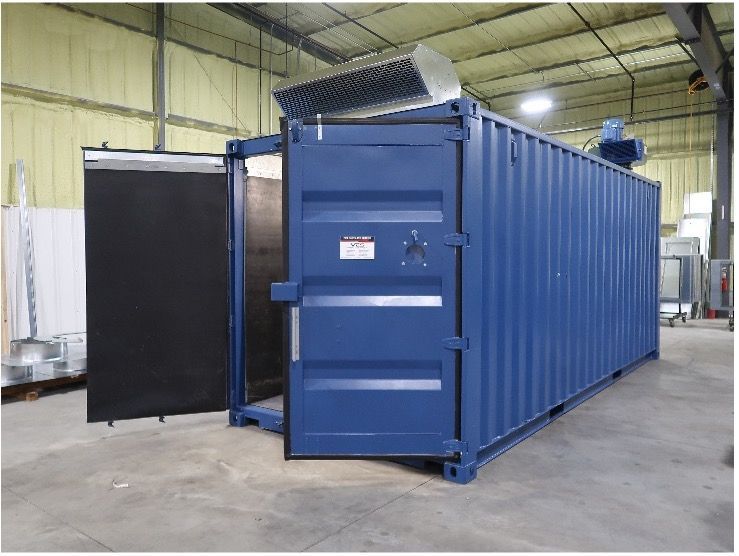 Pink sandblasting cabinet with two workstations, filter, and two black stools.