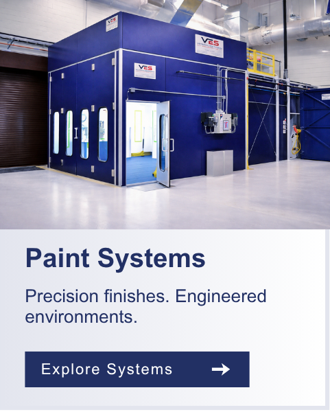 Blue industrial paint booth system with white access doors inside a clean facility.