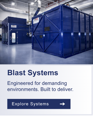 Large blue blast room system with enclosed workspace and industrial dust collection equipment.