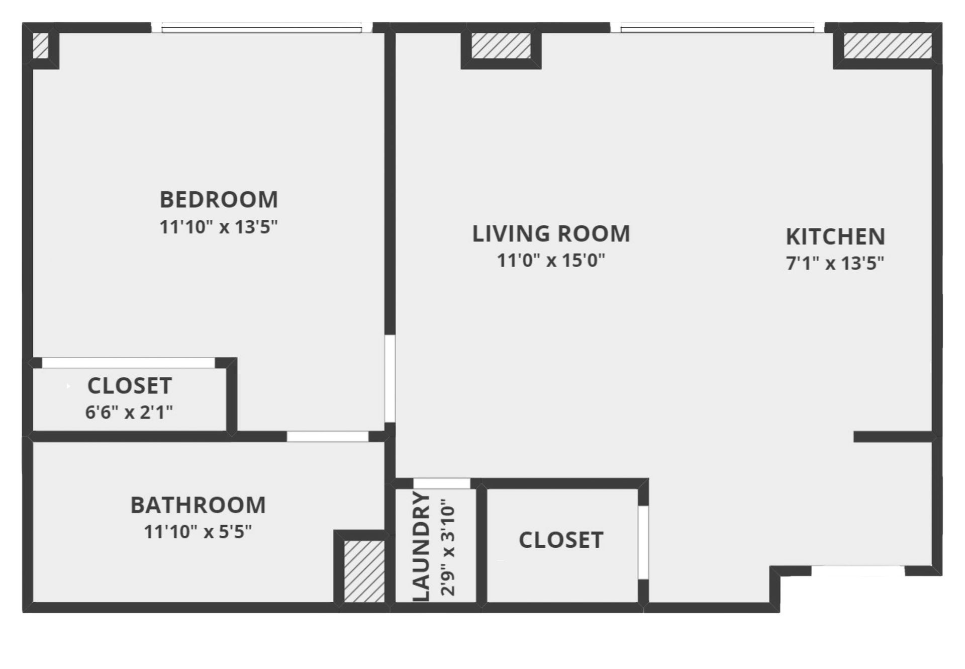 Floor plan of an apartment with a bedroom, living room, kitchen, bathroom, closets, and laundry area.