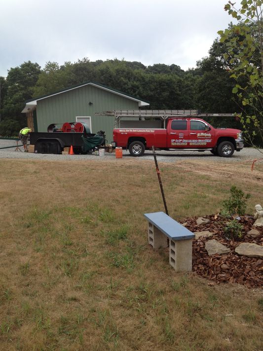 Newly installed siding and rain gutters in Homer City