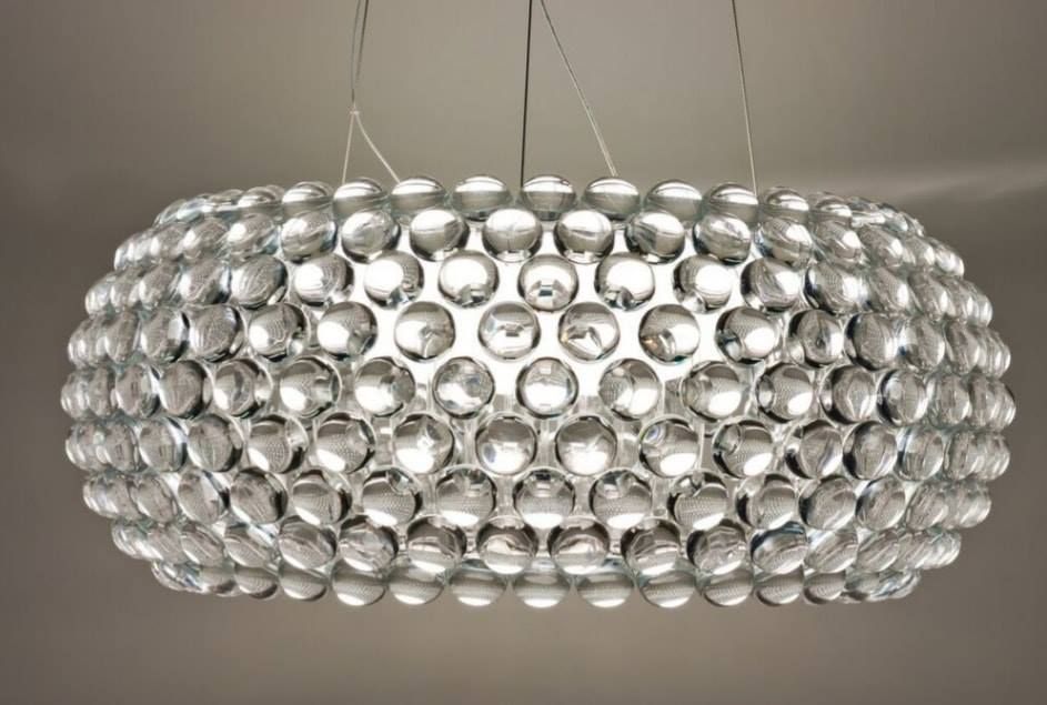 Modern chrome bubble chandelier with many circular reflective discs hanging from the ceiling