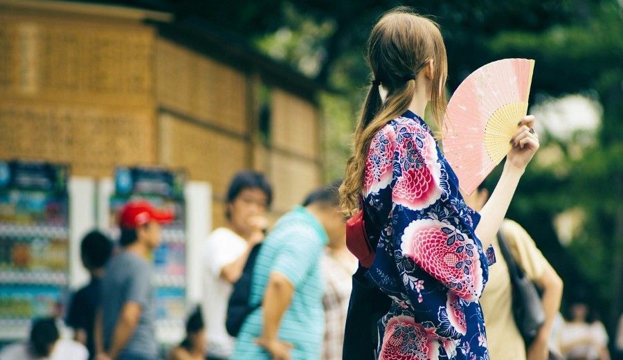 Girl wearing a Japanese yukata in the summer