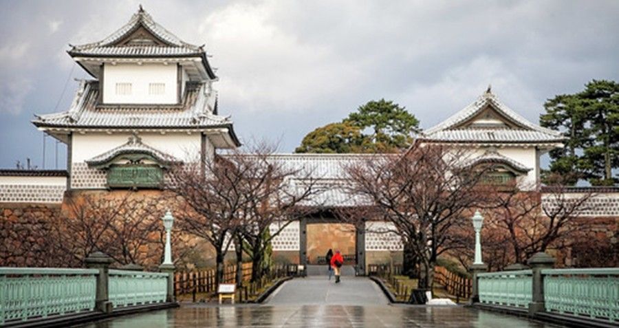 A bridge leading to Kanazawa Castle, pictured in autumn.