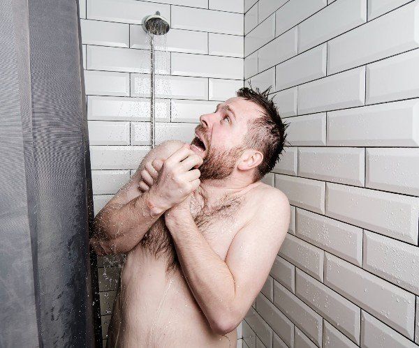 Man cold in the shower