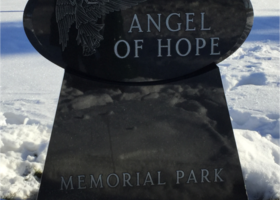 the angel of hope memorial park is located in the snow