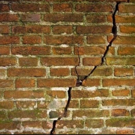 Cracked brick wall