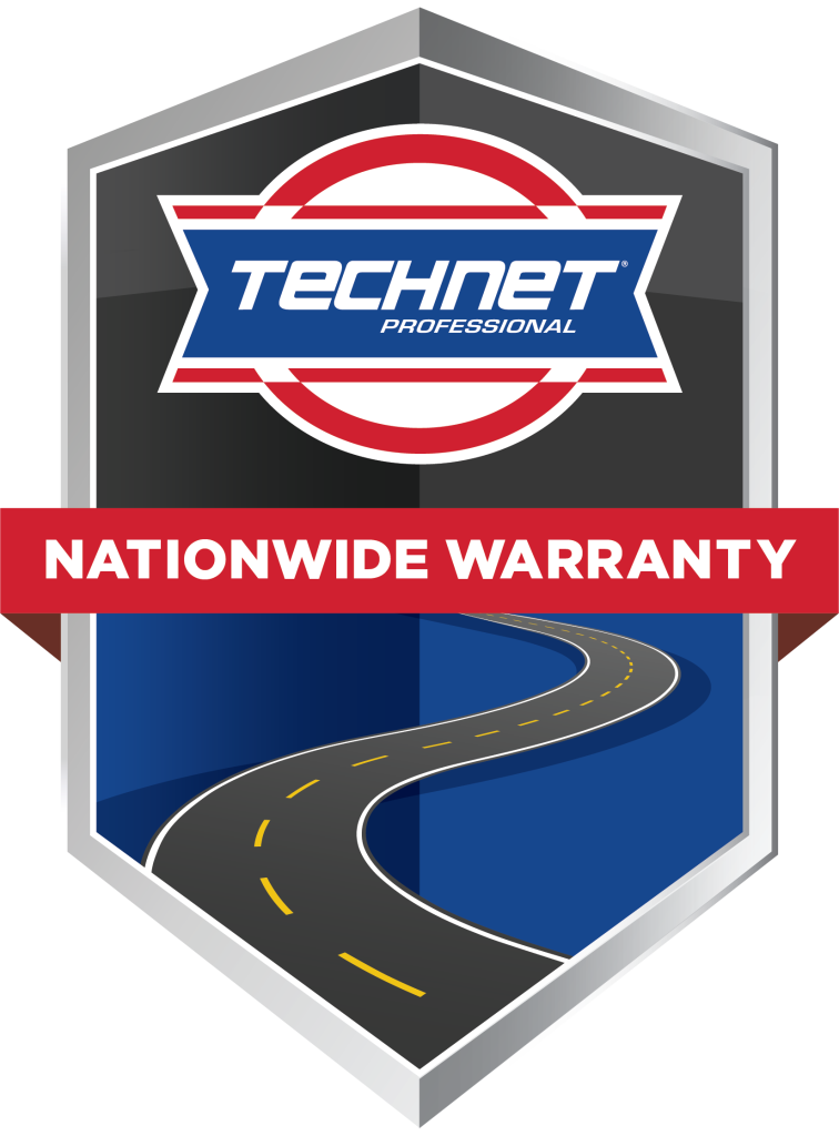 A shield with a road and the words `` technet professional nationwide warranty '' on it.