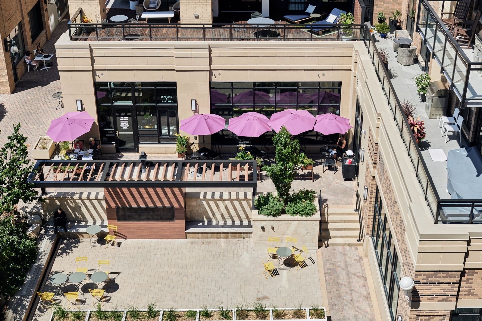 View of the 2nd-floor patio and the entry-level public plaza