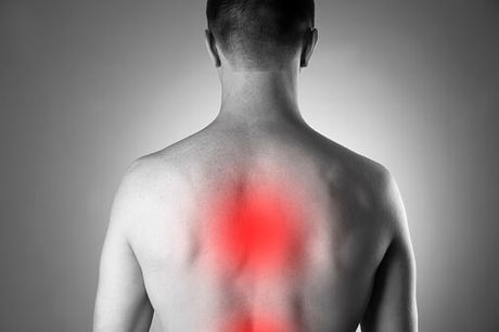 Man with back pain — Jersey City, NJ — Pain and Disability Institute